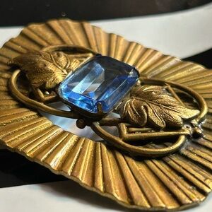 Vintage art deco gold tone blue glass brooch